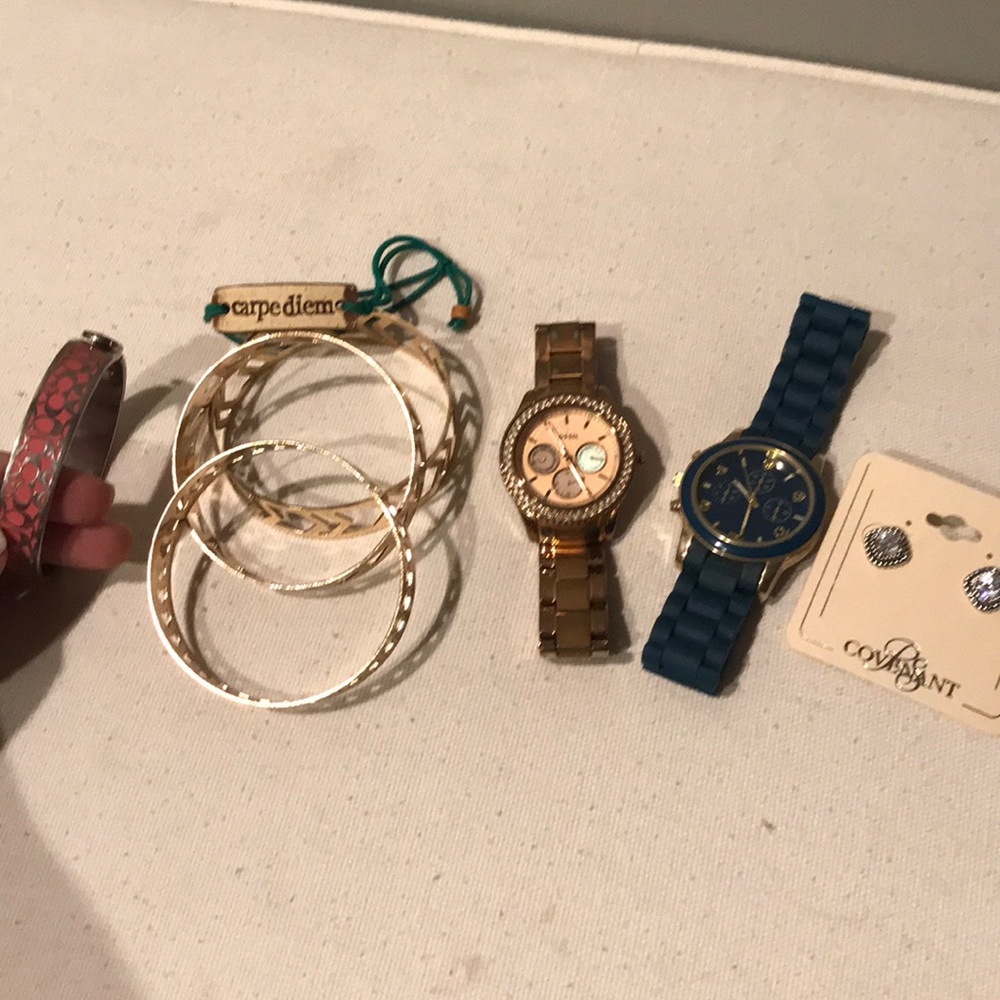 Lot of jewelry. Coach & fossil